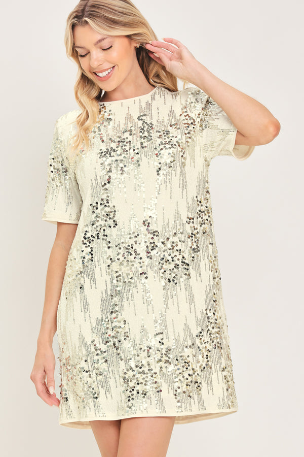 A woman modeling a short-sleeve cream sequined mini dress | Flying Tomato