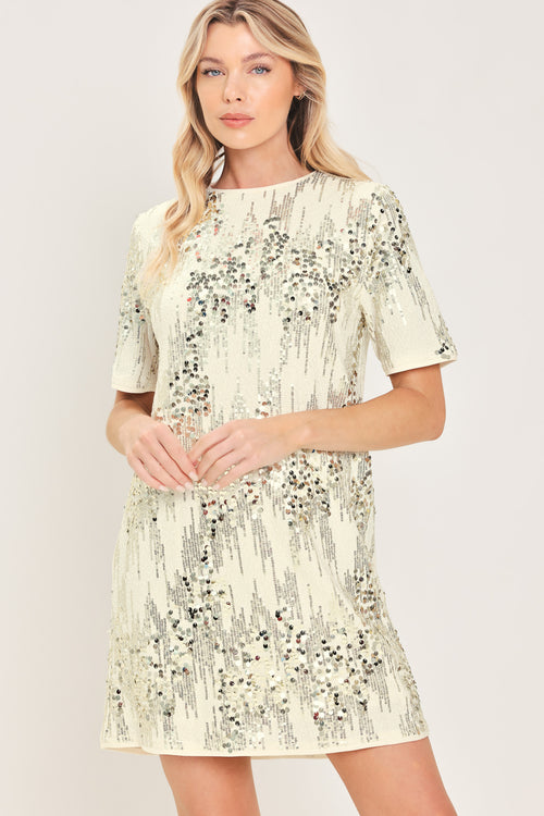 A woman modeling a short-sleeve cream sequined mini dress | Flying Tomato