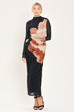 A woman modeling a black long-sleeve mock-neck mesh midi dress with a large abstract floral print in brown, beige, and white on the front | Flying Tomato