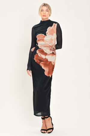 A woman modeling a black long-sleeve mock-neck mesh midi dress with a large abstract floral print in brown, beige, and white on the front | Flying Tomato