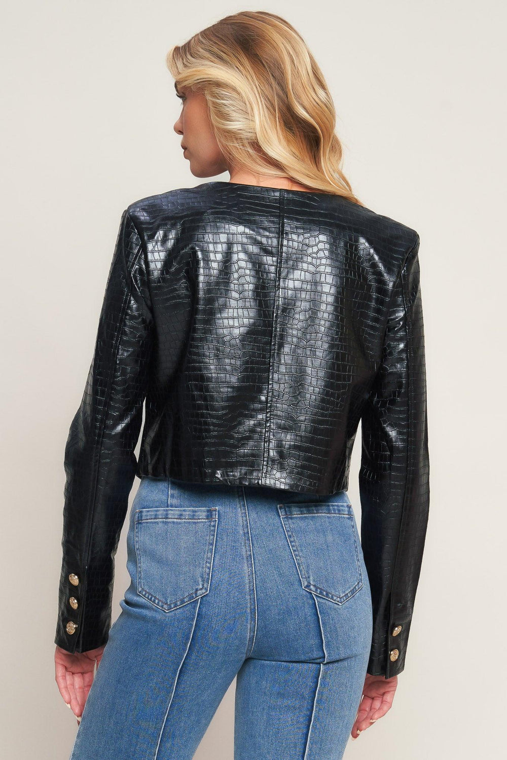 AT THE START FAUX LEATHER BOLERO JACKET.