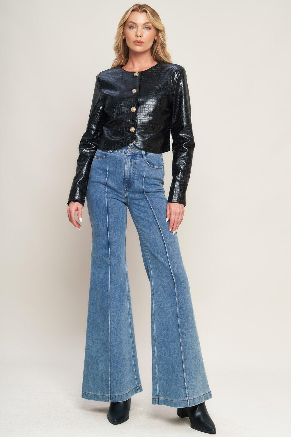 AT THE START FAUX LEATHER BOLERO JACKET.