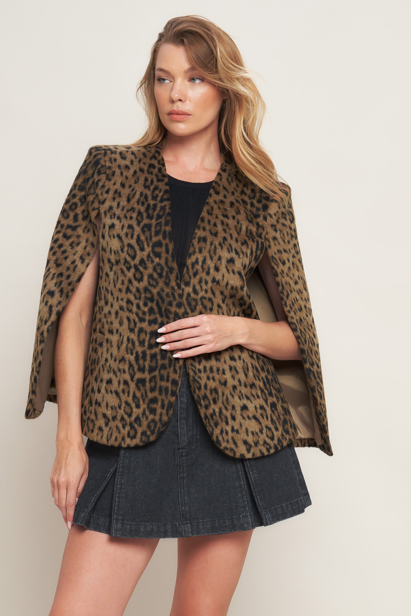 A leopard fur woven capelet