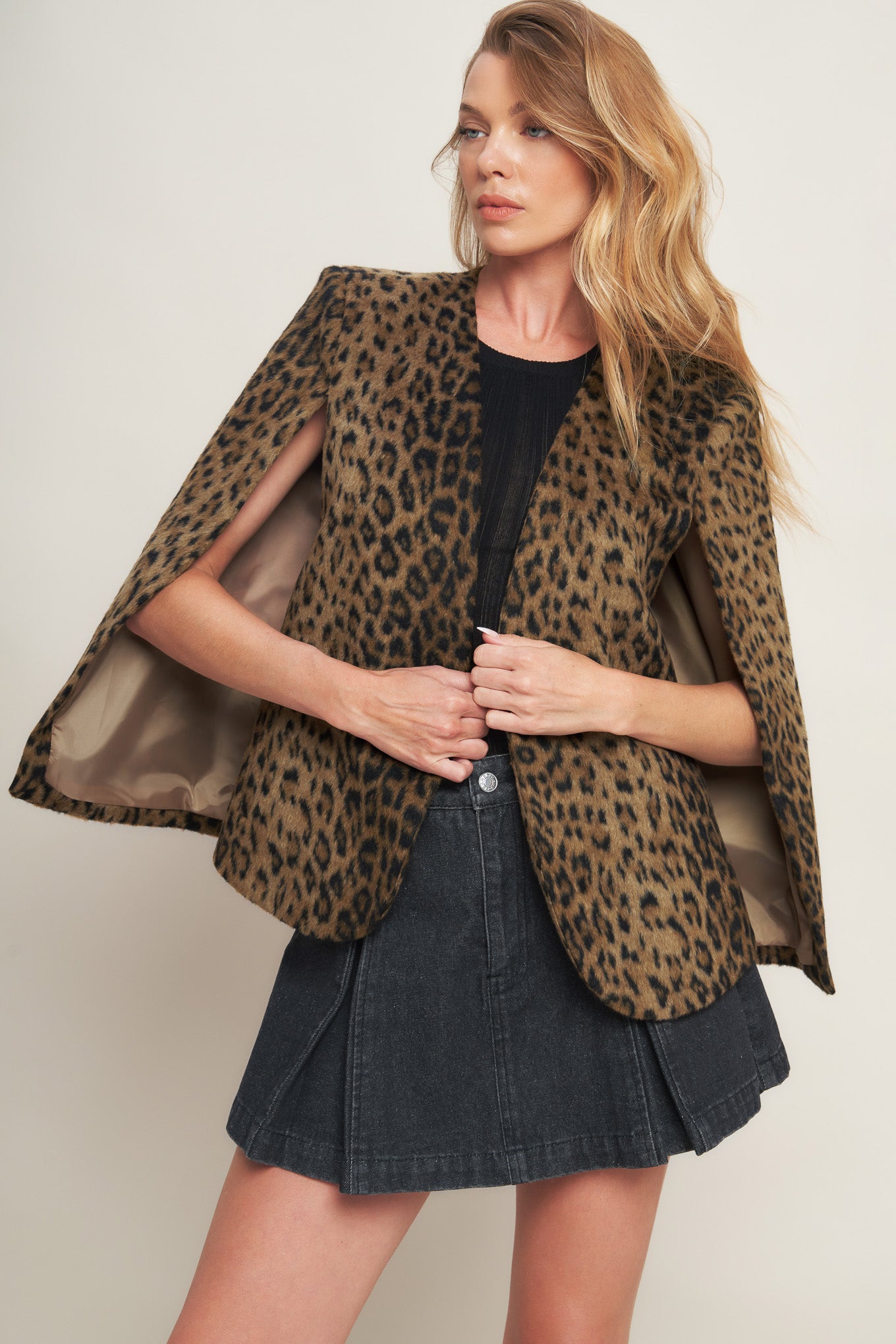 A leopard fur woven capelet