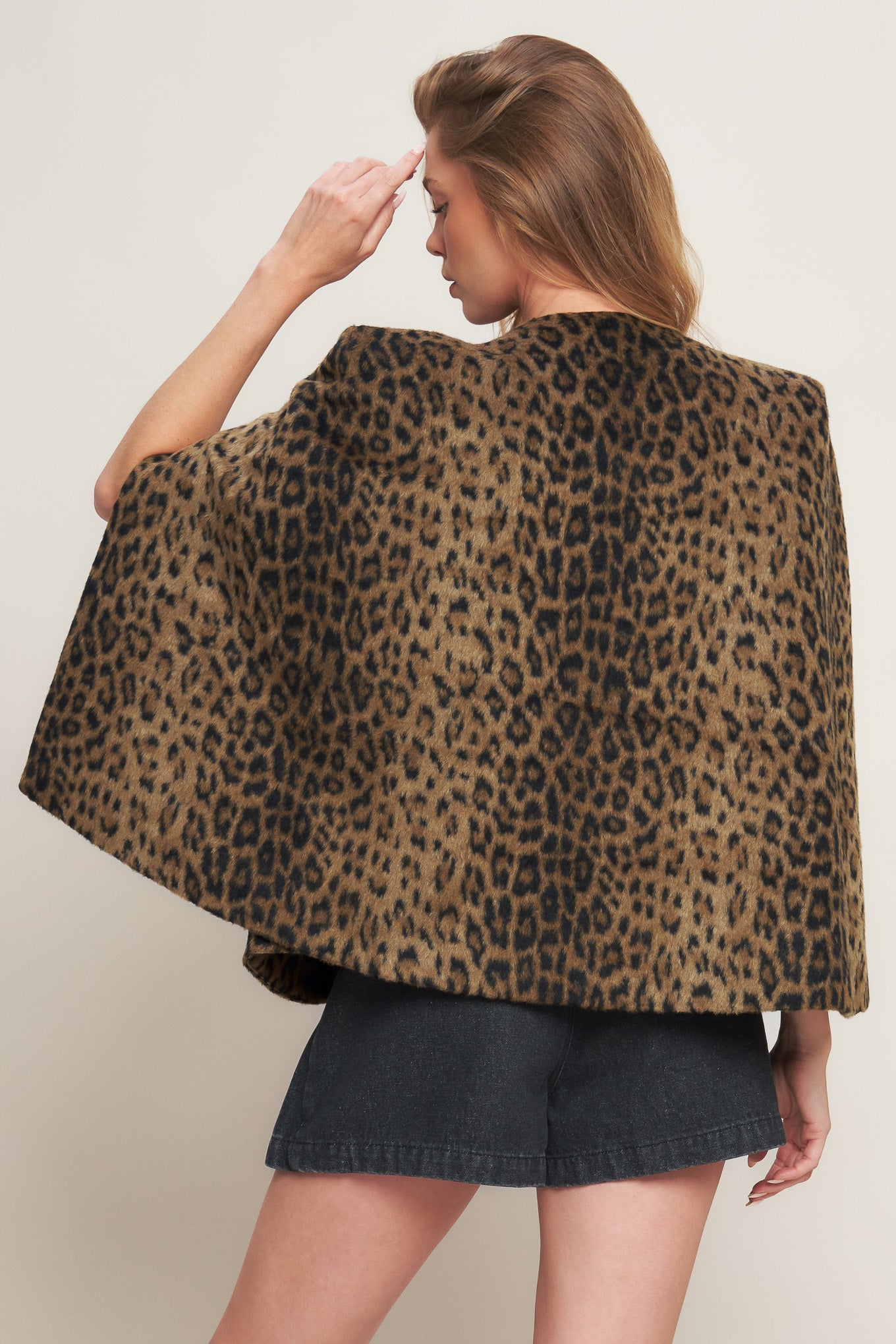 A leopard fur woven capelet