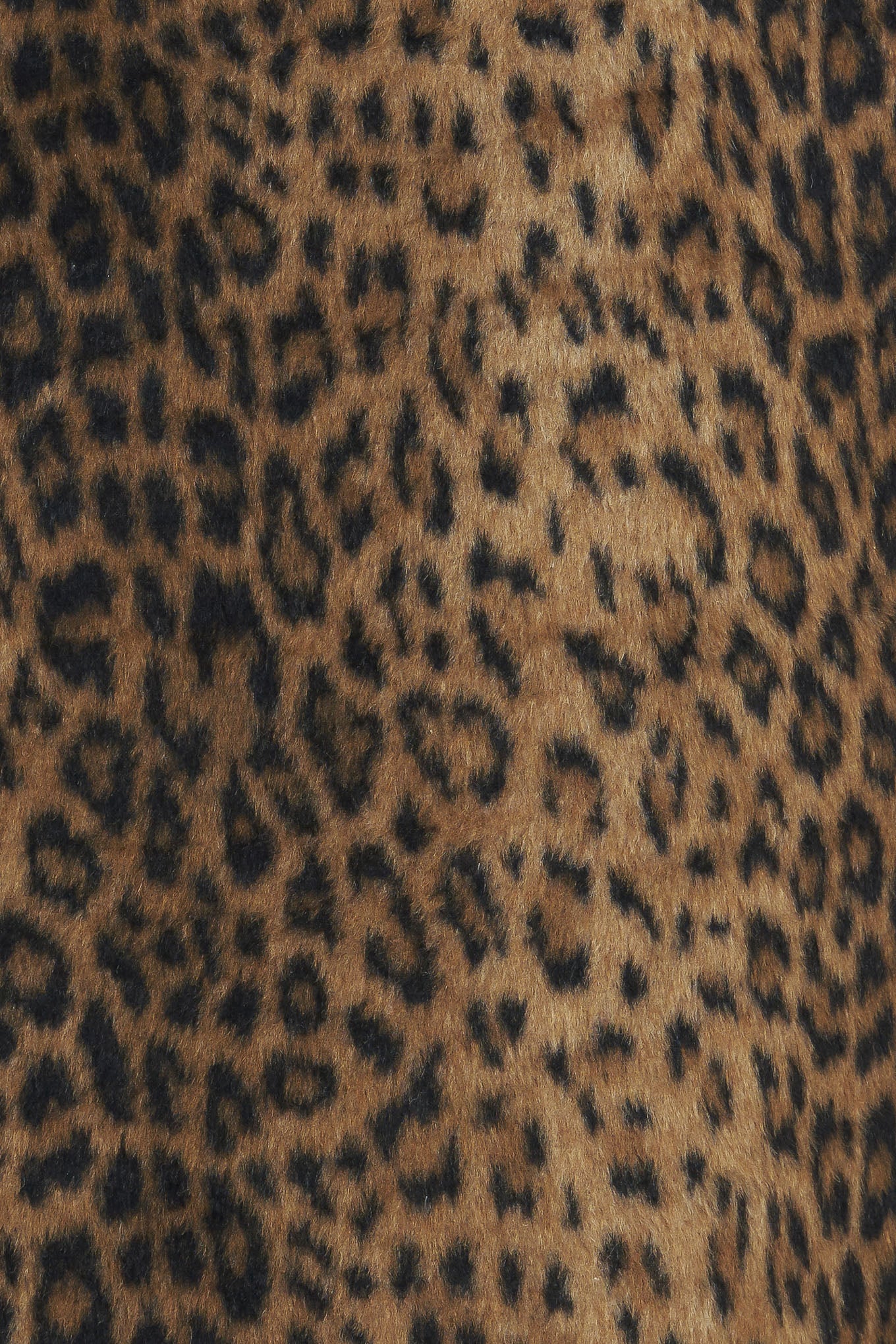A leopard fur woven capelet