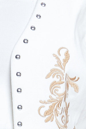 A solid woven vest featuring embroidery, stud embellishment and open front. Matching skort IP9121T

Details:

Self: 97% Cotton 3% Spandex

Size & Fit

-Model is 5`8" And Wearing Size Small
-Measurements Taken From Size Small
-Approx. Length: 20"