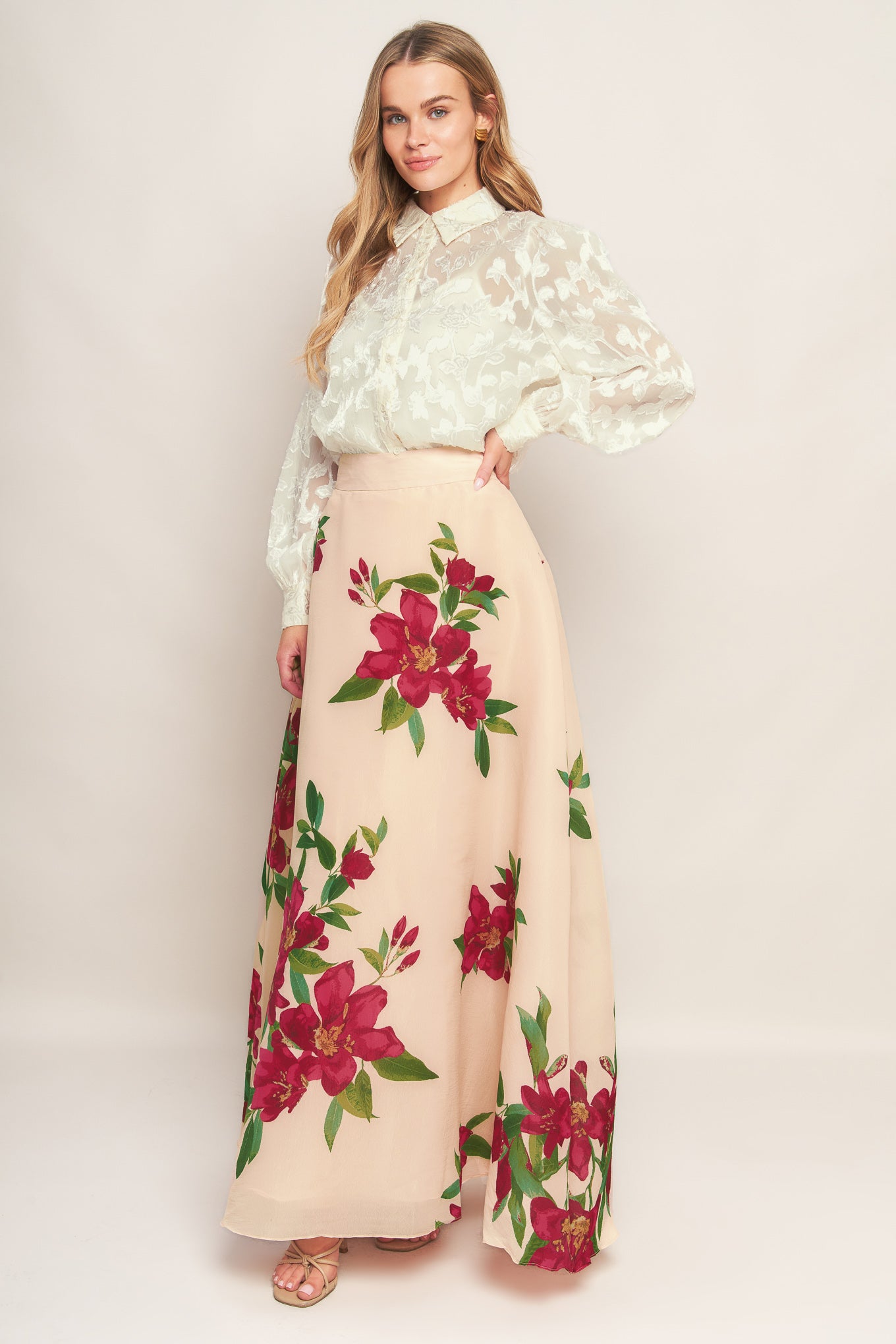 A floral printed woven maxi skirt with side zipper closure