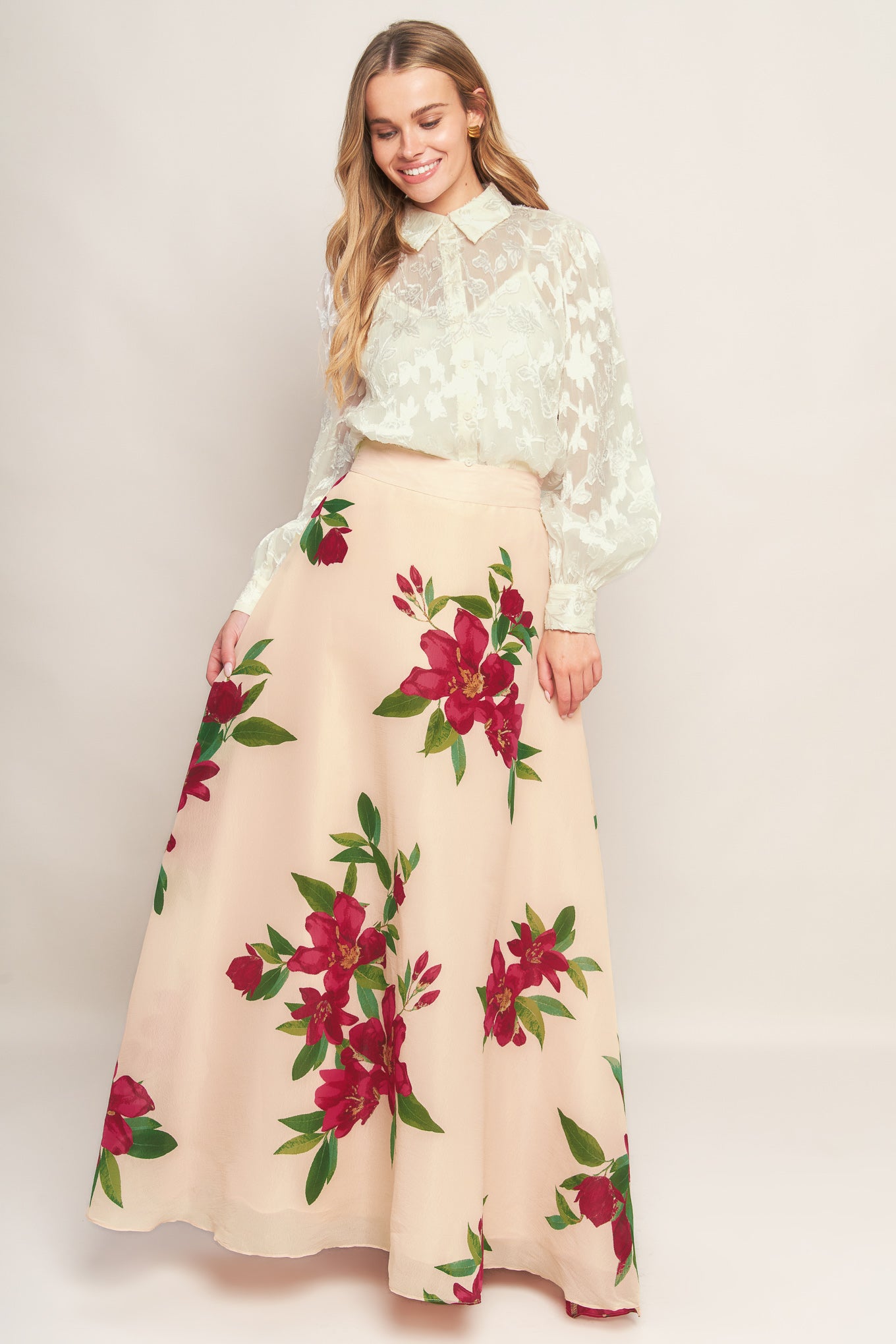 A floral printed woven maxi skirt with side zipper closure