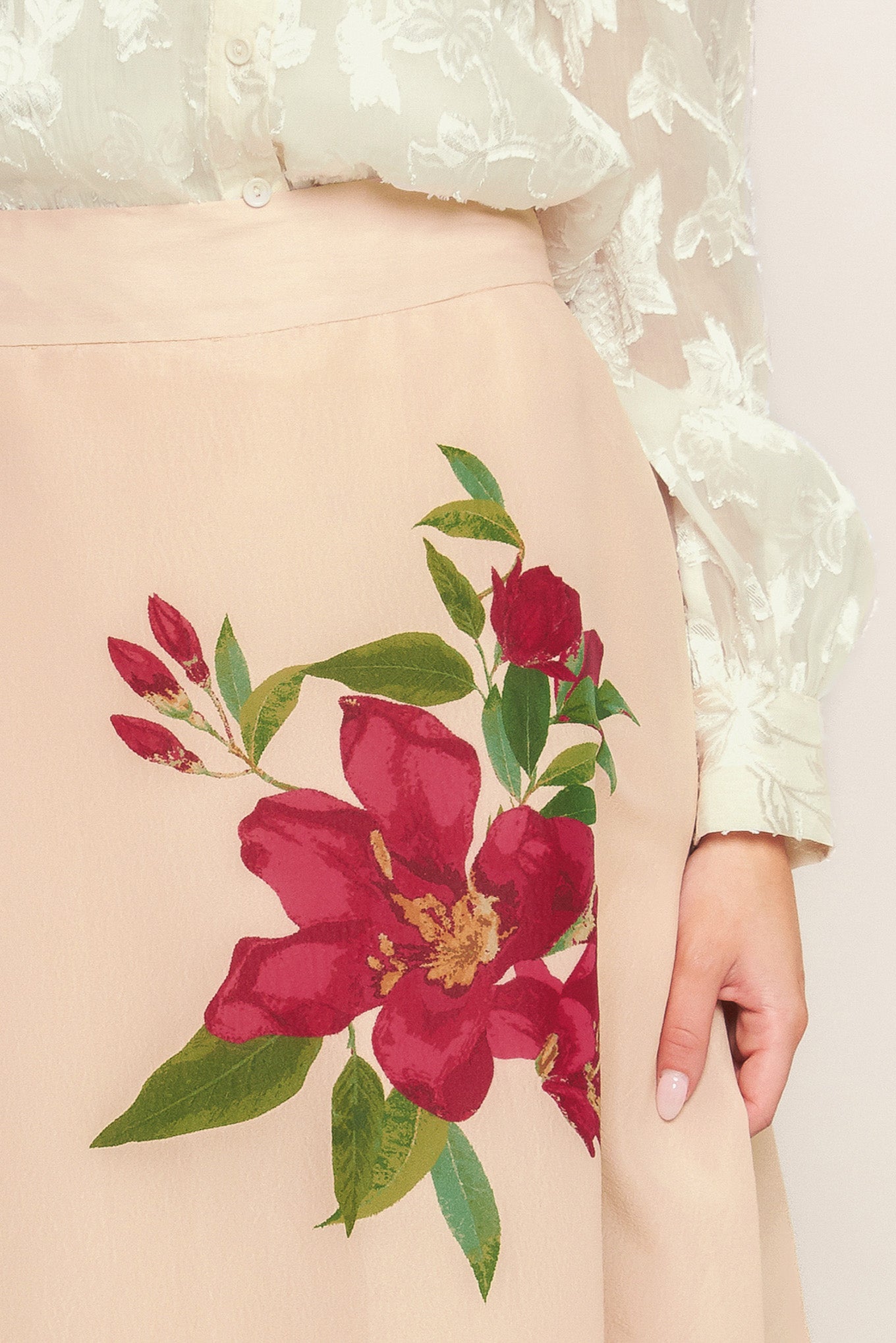 A floral printed woven maxi skirt with side zipper closure