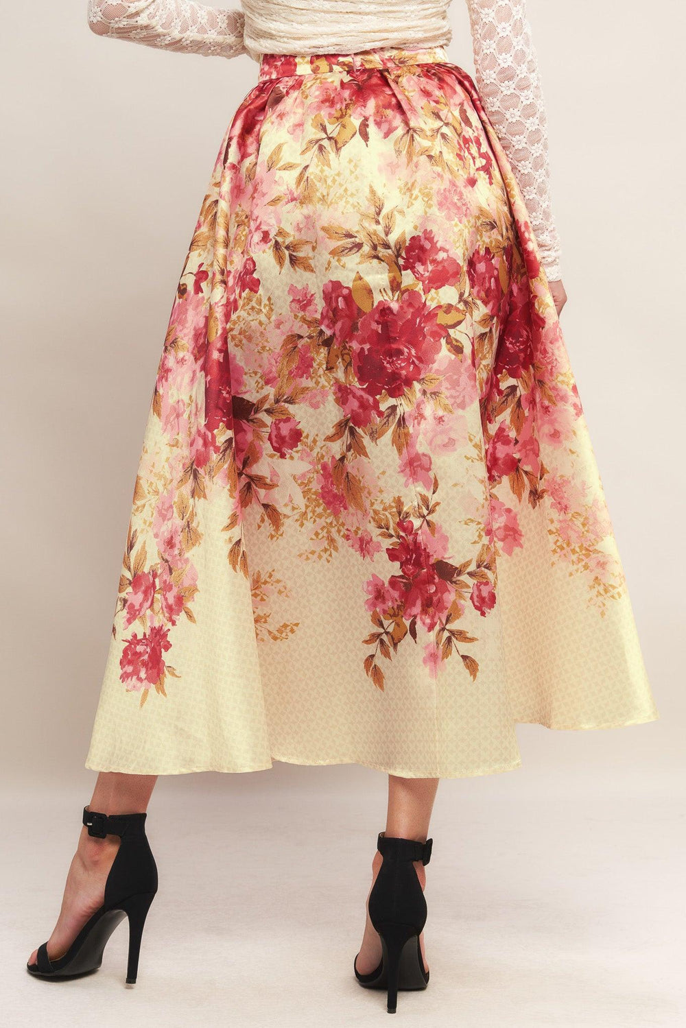 A printed woven full midi skirt with back zipper closure.