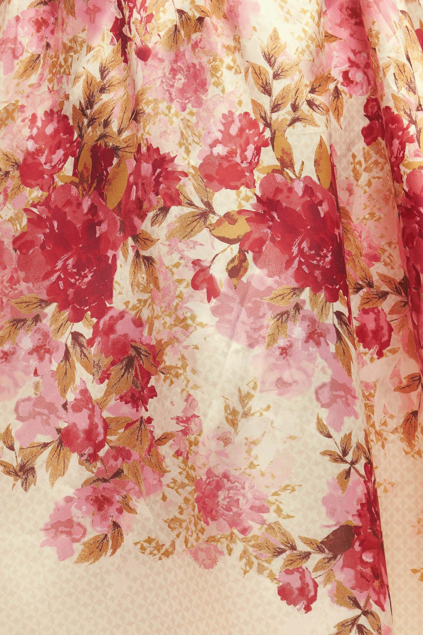 A printed woven full midi skirt with back zipper closure.