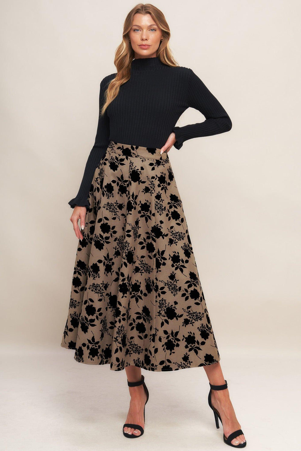 A woven flocking circle skirt with side zipper closure
