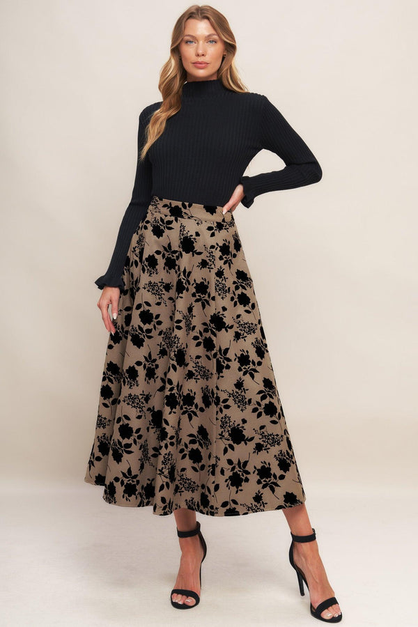 A woven flocking circle skirt with side zipper closure