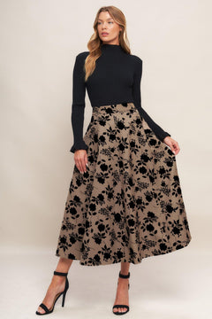 A woven flocking circle skirt with side zipper closure