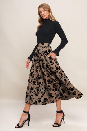 A woven flocking circle skirt with side zipper closure