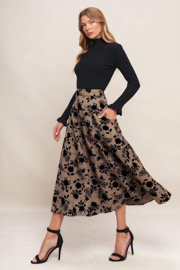 A woven flocking circle skirt with side zipper closure