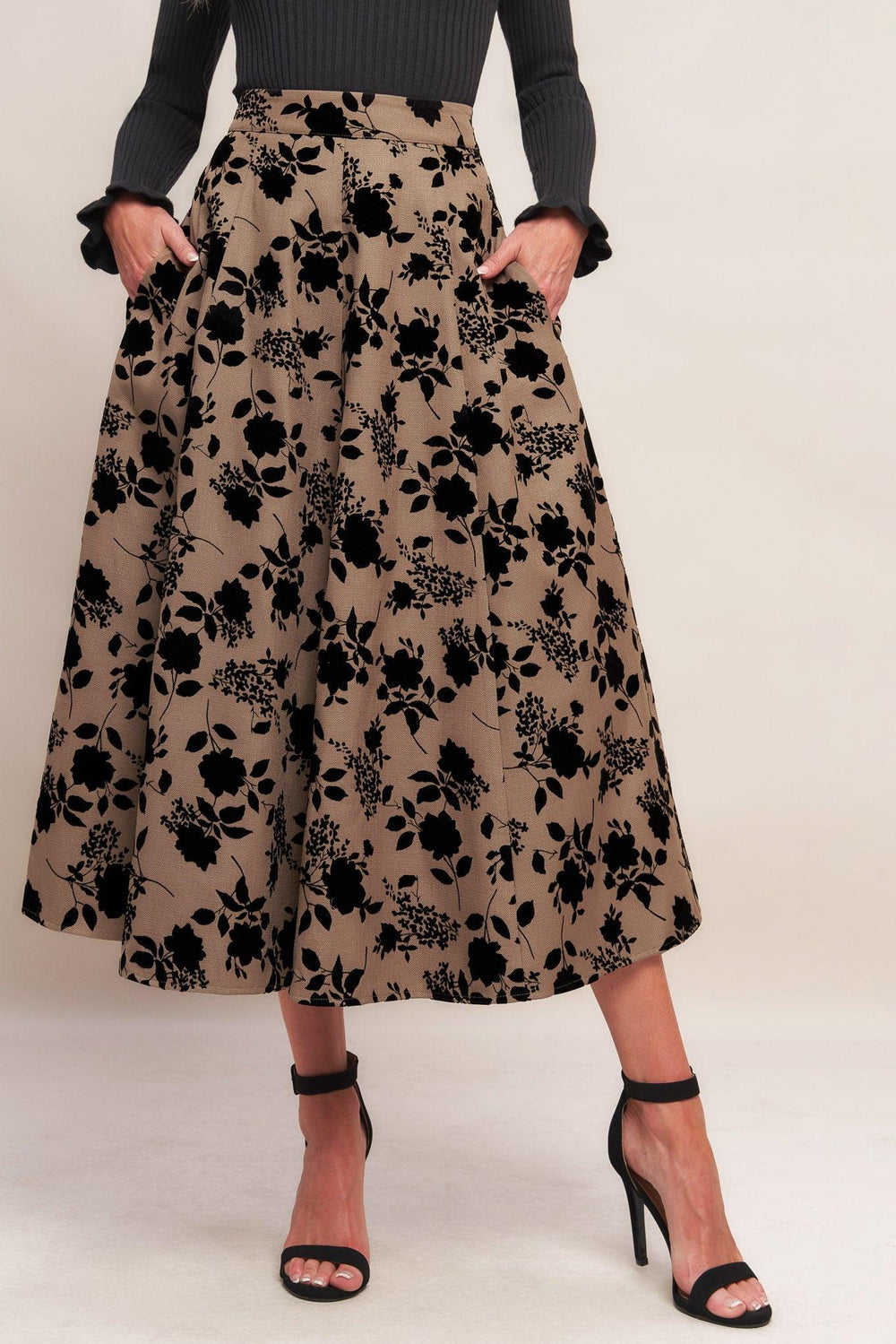 A woven flocking circle skirt with side zipper closure