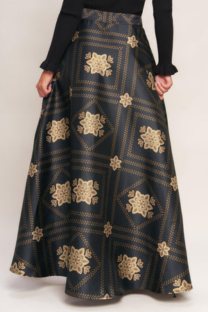 A printed woven maxi circle skirt with side zipper closure