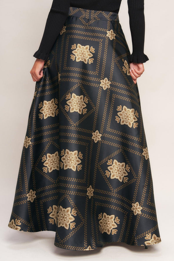 A printed woven maxi circle skirt with side zipper closure