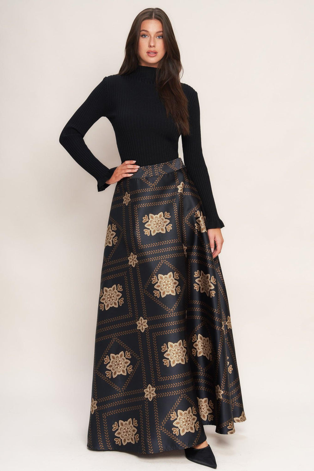 A printed woven maxi circle skirt with side zipper closure