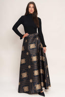 A printed woven maxi circle skirt with side zipper closure