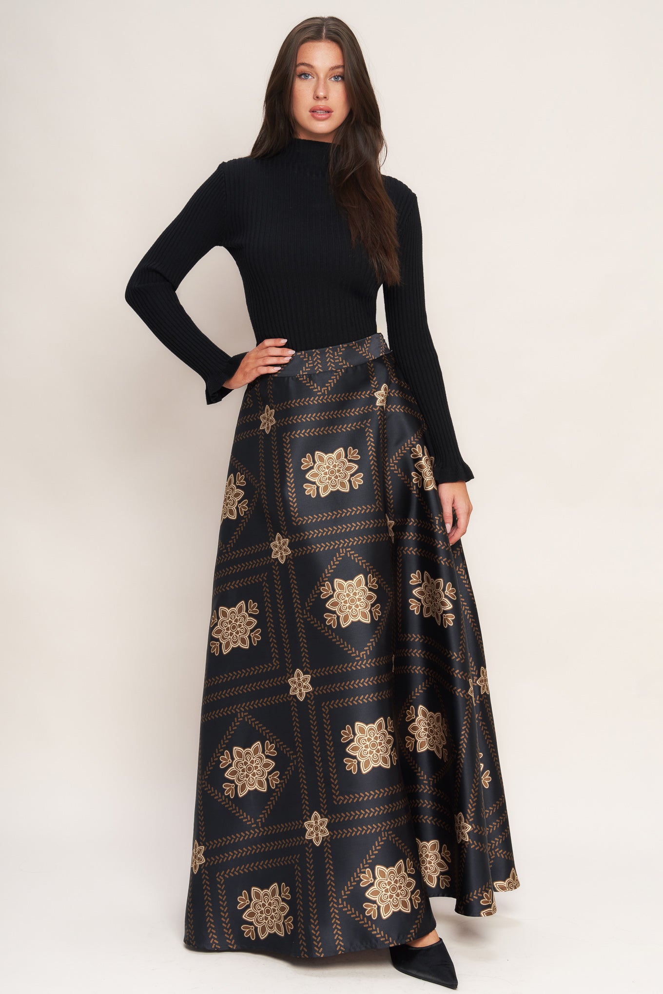 A printed woven maxi circle skirt with side zipper closure