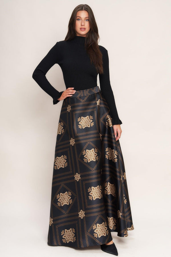 A printed woven maxi circle skirt with side zipper closure