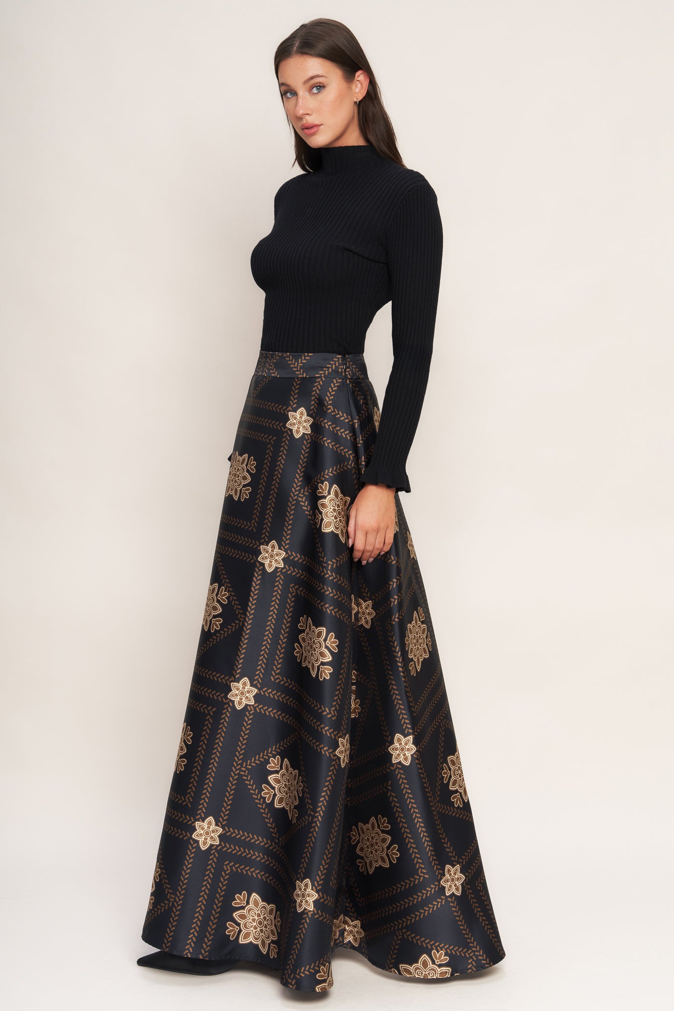 A printed woven maxi circle skirt with side zipper closure