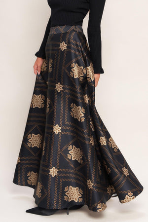 A printed woven maxi circle skirt with side zipper closure