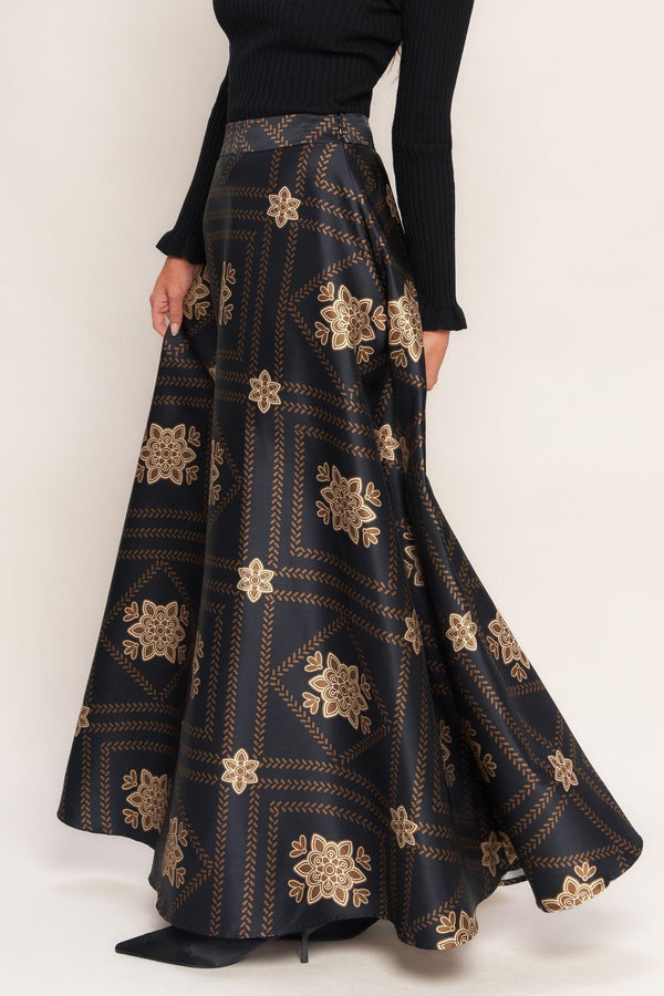 A printed woven maxi circle skirt with side zipper closure