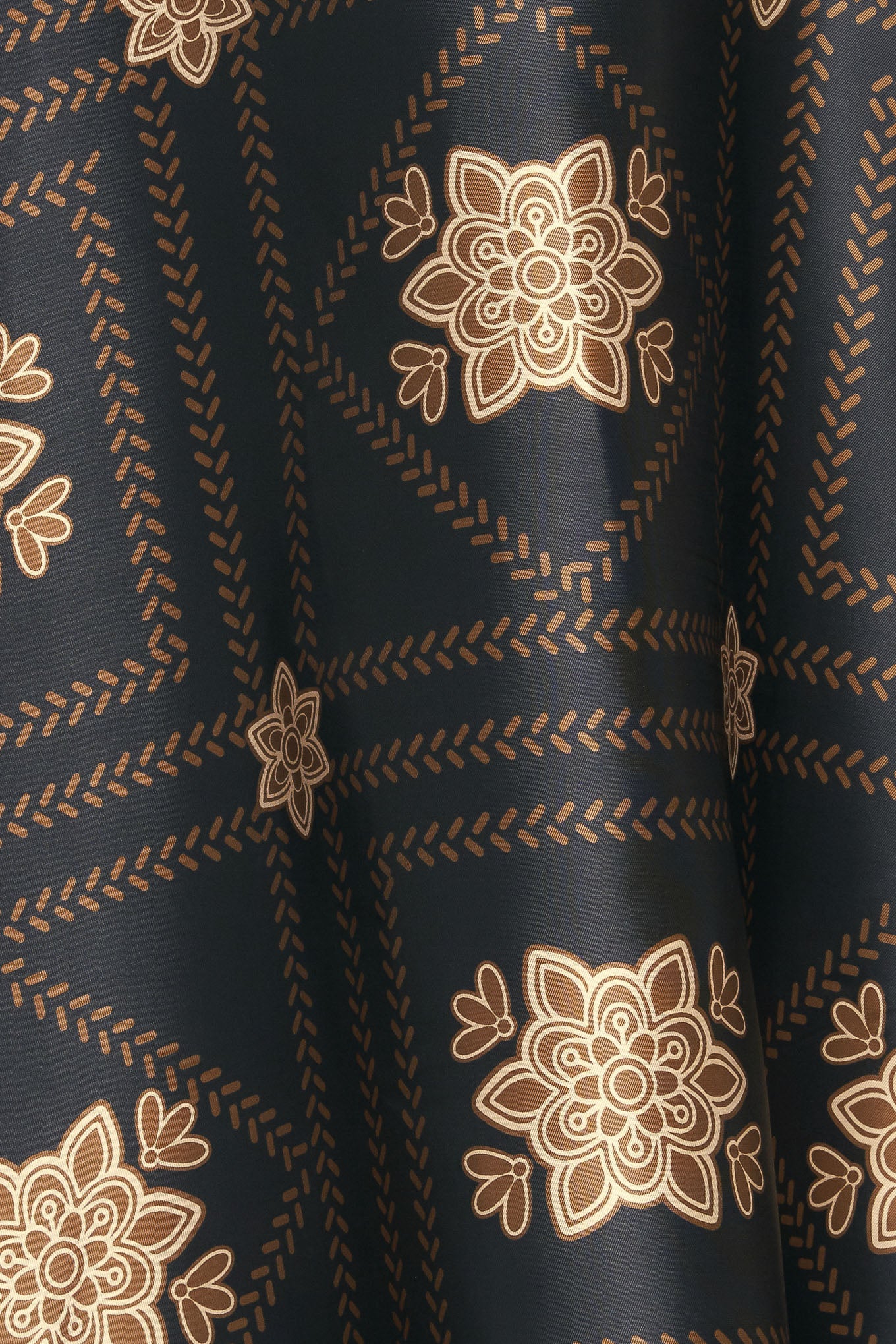 A printed woven maxi circle skirt with side zipper closure