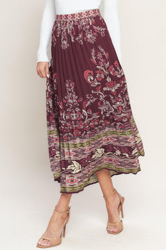 A printed woven pleated midi skirt with side zipper closure. Matching top IT13890