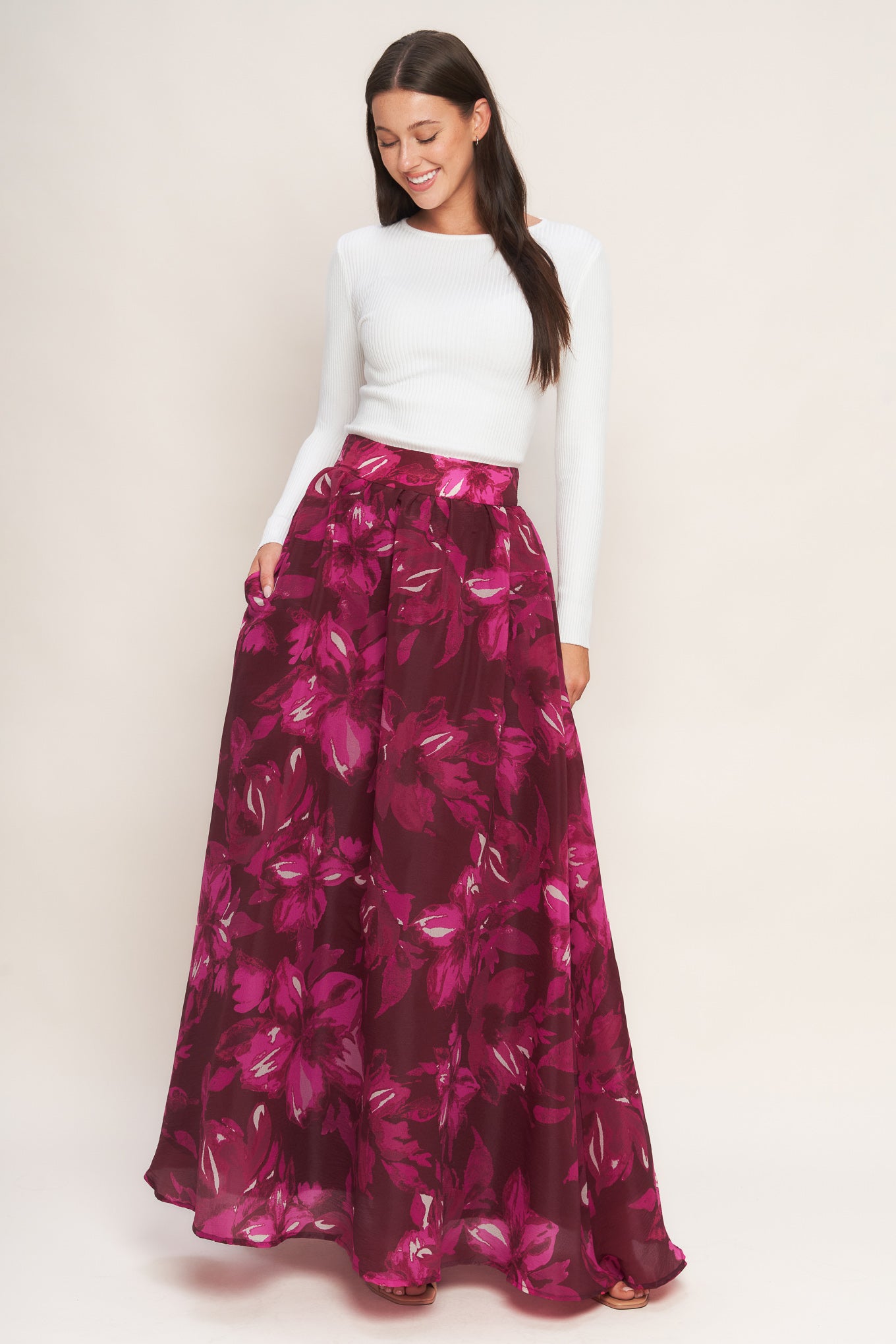 A printed woven maxi full skirt with back zipper closure