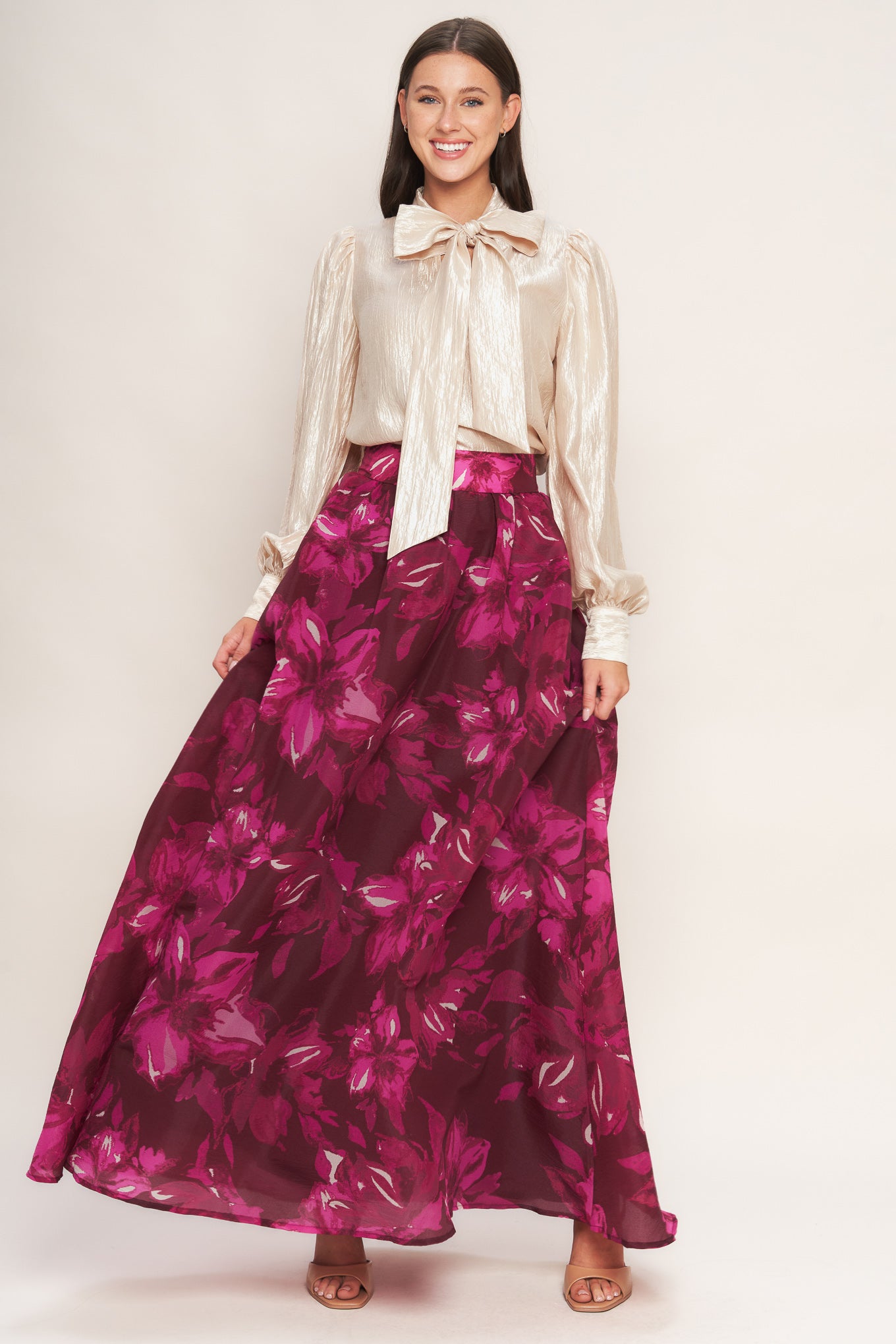 A printed woven maxi full skirt with back zipper closure