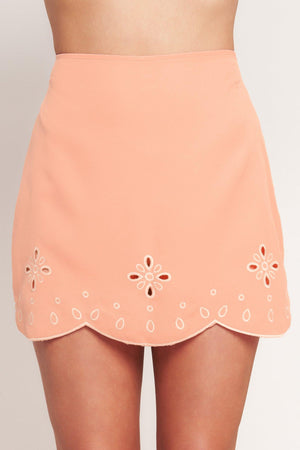 
A solid woven mini skirt with side zipper closure and eyelet embroidered scalloped hemline

Details:

Self : 97% Polyester 3% Spandex
Lining : 100% Polyester

Size &amp; Fit

- Model is 5`8" And Wearing Size Small
- Measurements Taken From Size Small
- Approx. Length: 15"