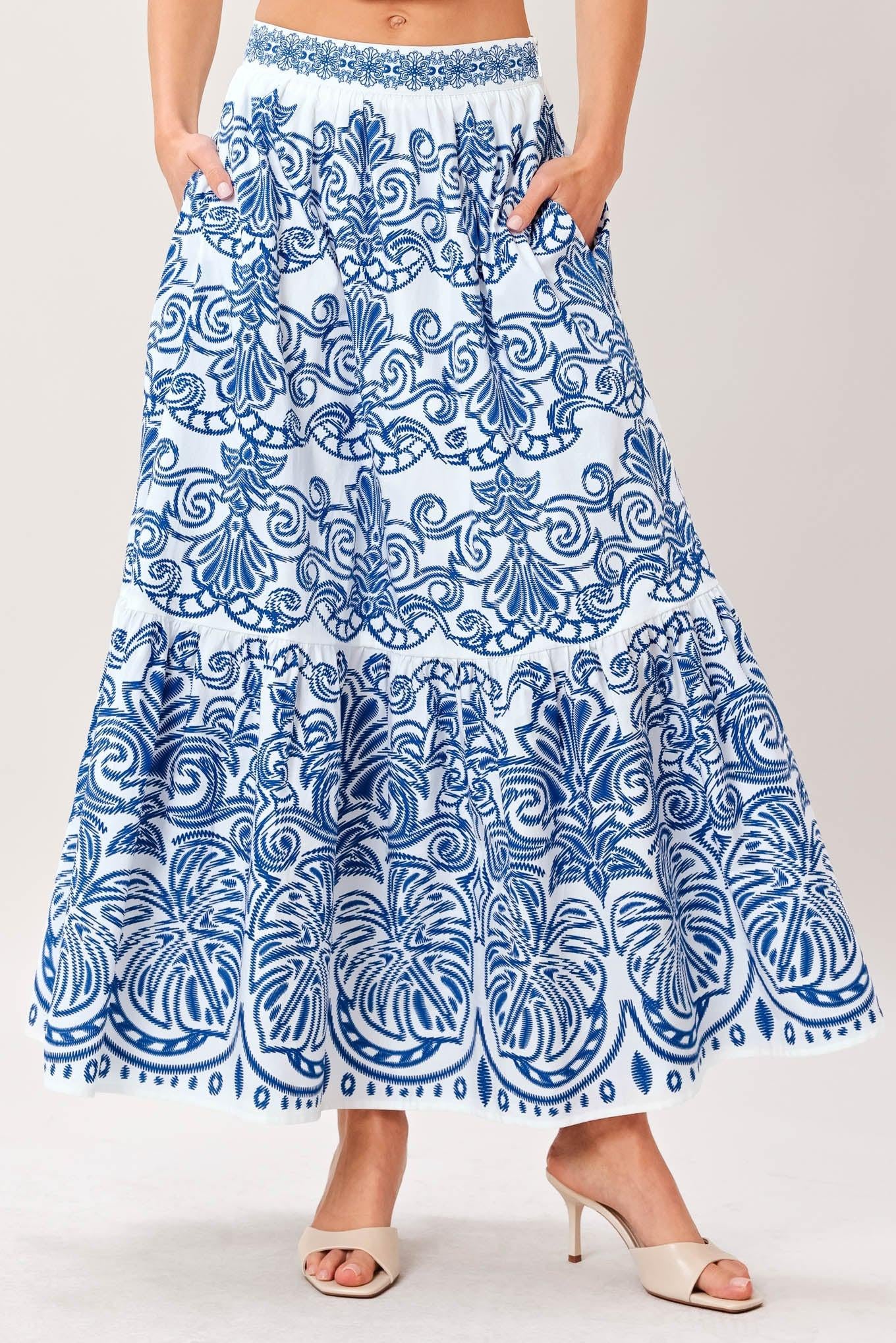 A printed woven full midi skirt with single tier and side zipper closure