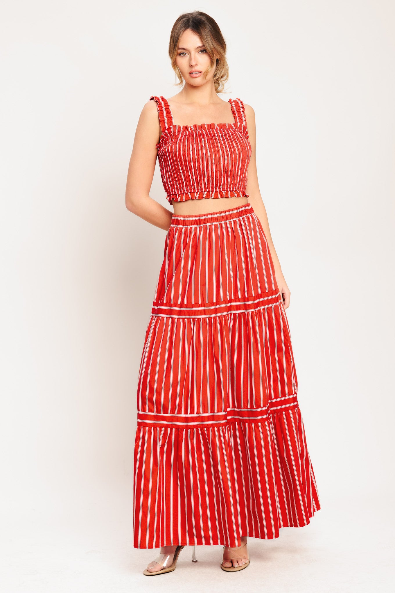 A striped woven maxi skirt with elastic waist and tiered skirt. Matching top IT13960B

Details:

Self: 100% Cotton

Lining: 100% Polyester

Size & Fit

-Model is 5`8" And Wearing Size Small
-Measurements Taken From Size Small
-Approx. Length: 42"