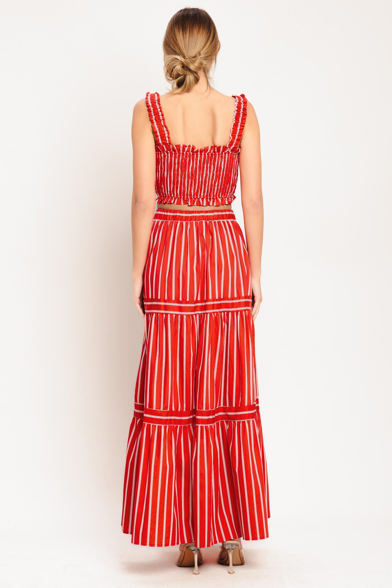 A striped woven maxi skirt with elastic waist and tiered skirt. Matching top IT13960B

Details:

Self: 100% Cotton

Lining: 100% Polyester

Size & Fit

-Model is 5`8" And Wearing Size Small
-Measurements Taken From Size Small
-Approx. Length: 42"