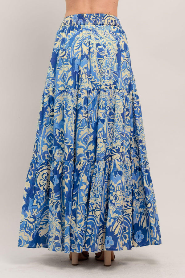 
A printed woven maxi skirt featuring tiered skirt and smocked back waistband

Details:

Self : 100% Cotton
Lining : 100% Polyester

Size & Fit

- Model is 5`8" And Wearing Size Small
- Measurements Taken From Size Small
- Approx. Length: 42"
