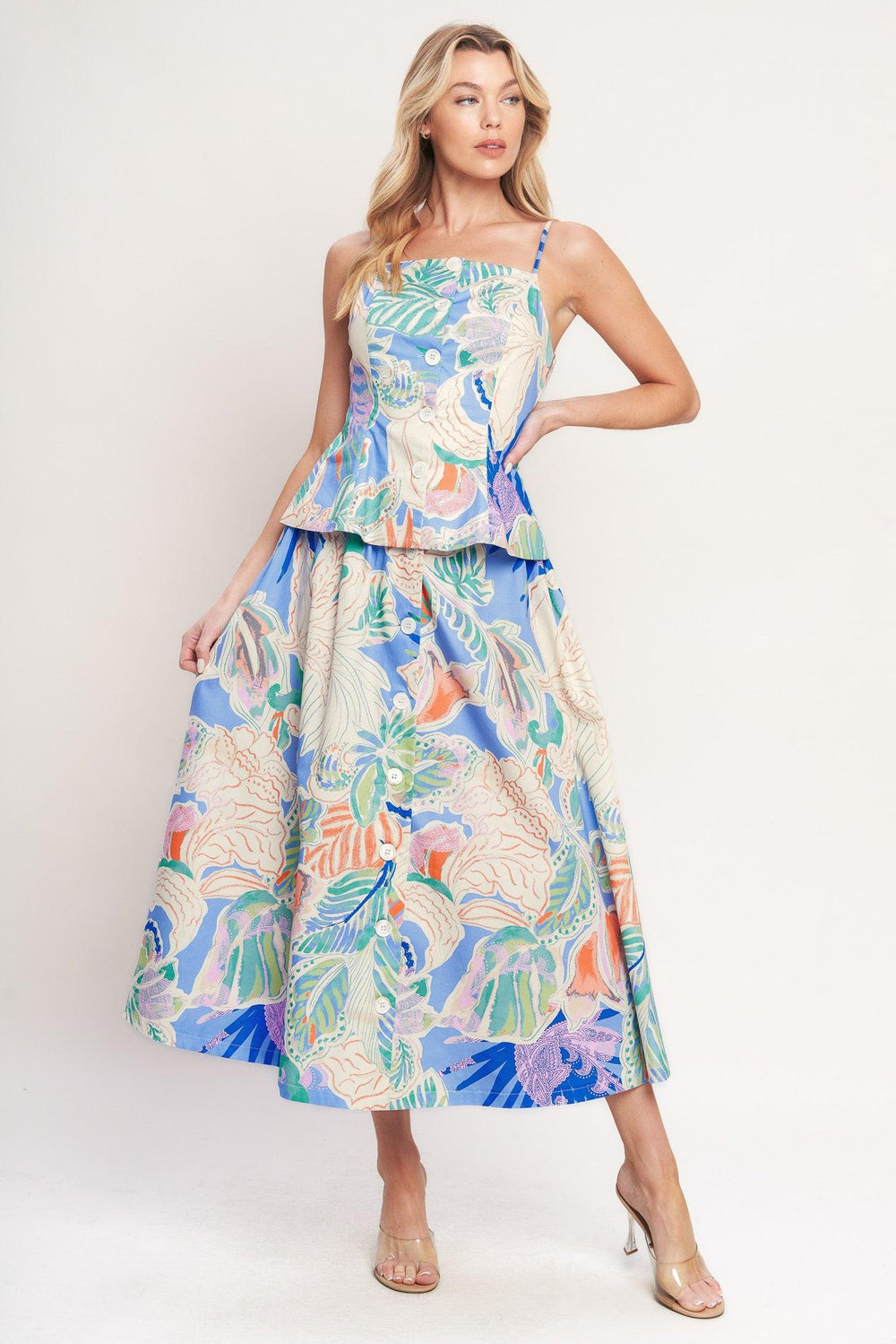 A printed woven full skirt with front button closure

Details:

Self : 100% Cotton

Size & Fit

-Model is 5`8" And Wearing Size Small
-Measurements Taken From Size Small
-Approx. Length: 36"