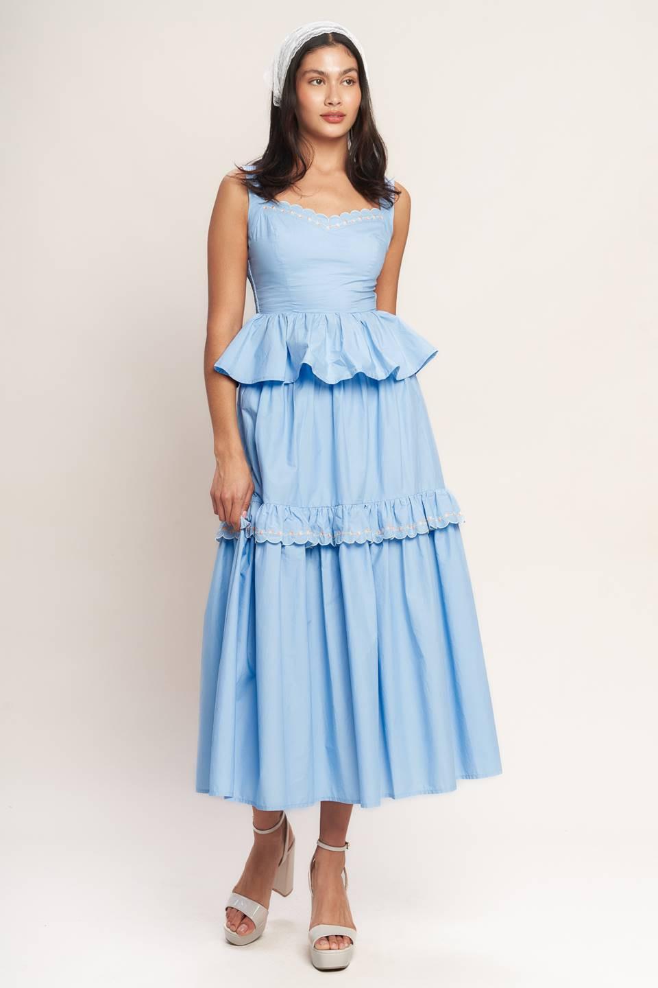 
A solid woven midi skirt featuring one tier skirt with embroidered ruffle and elasticized back waistband. Matching top IT14036B

Details:

Self : 100% Cotton
Lining : 100% Polyester

Size &amp; Fit

- Model is 5`8" And Wearing Size Small
- Measurements Taken From Size Small
- Approx. Length: 35" - Flying Tomato