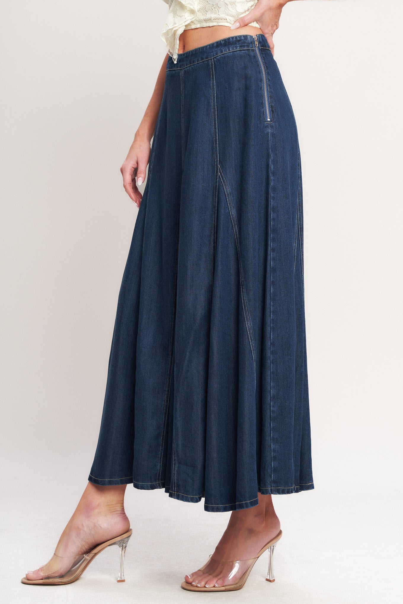 
A woven circle skirt with side zipper closure

Details:

Self : 100% Lyocell

Size &amp; Fit

- Model is 5`8" And Wearing Size Small
- Measurements Taken From Size Small
- Approx. Length: 37"