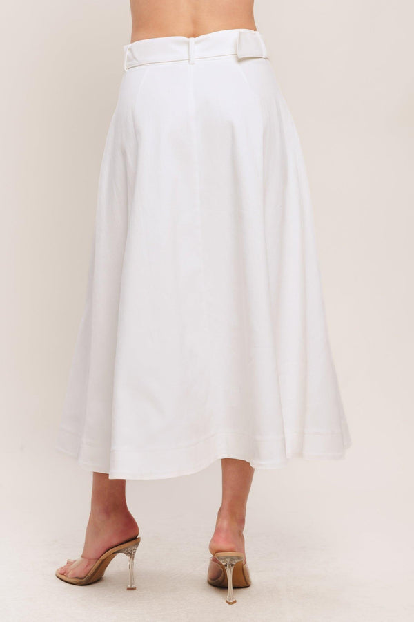 A solid woven midi skirt featuring self belt, front button down and pockets. Matching top IT14089B

Details:

Self: 97% Cotton 3% Spandex

Size & Fit

-Model is 5`8" And Wearing Size Small
-Measurements Taken From Size Small
-Approx. Length: 34"