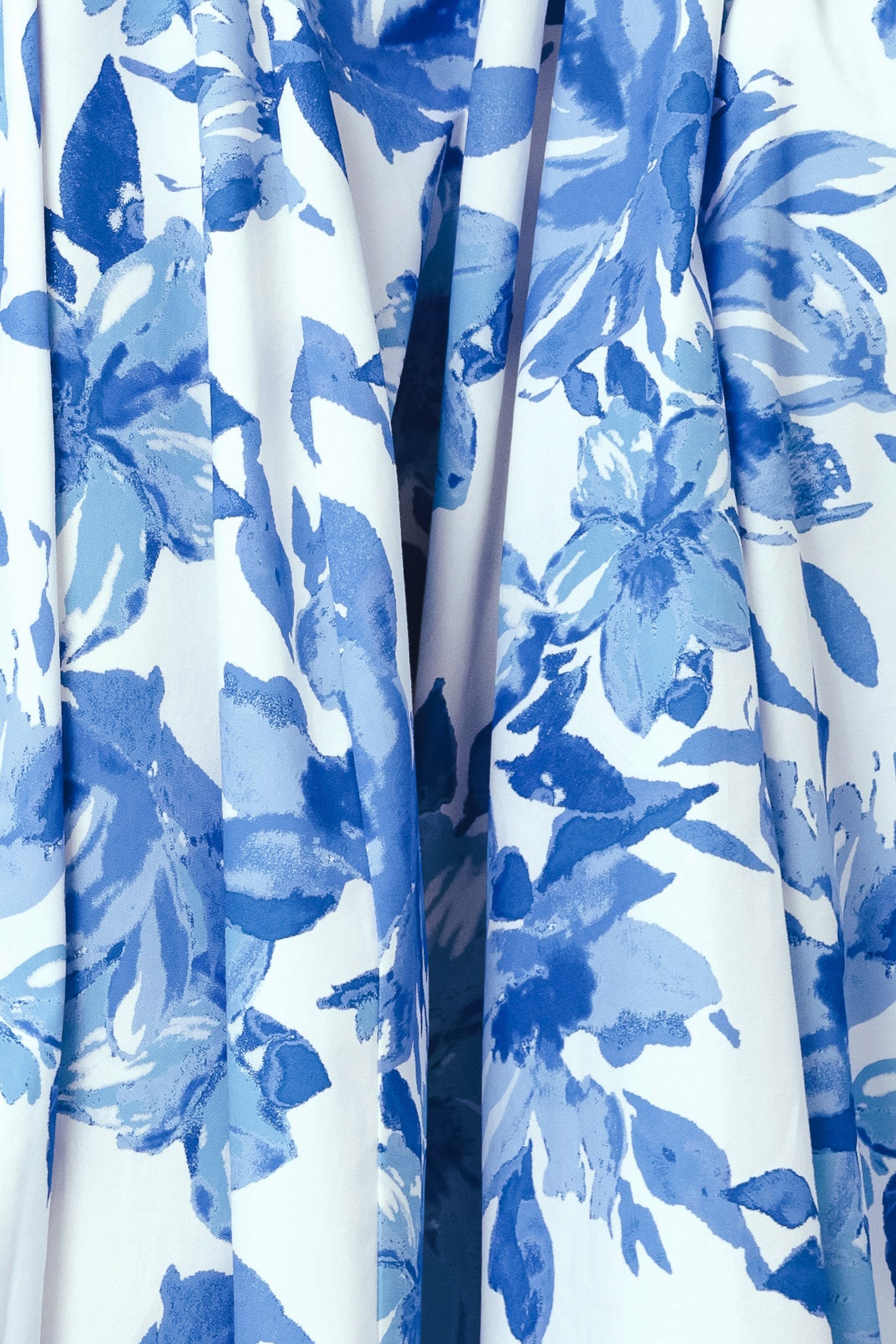 Blue and white floral patterned fabric with a tie | Flying Tomato