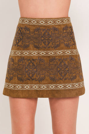 A camel mini skirt with a dark brown damask pattern and cream geometric borders | Flying Tomato