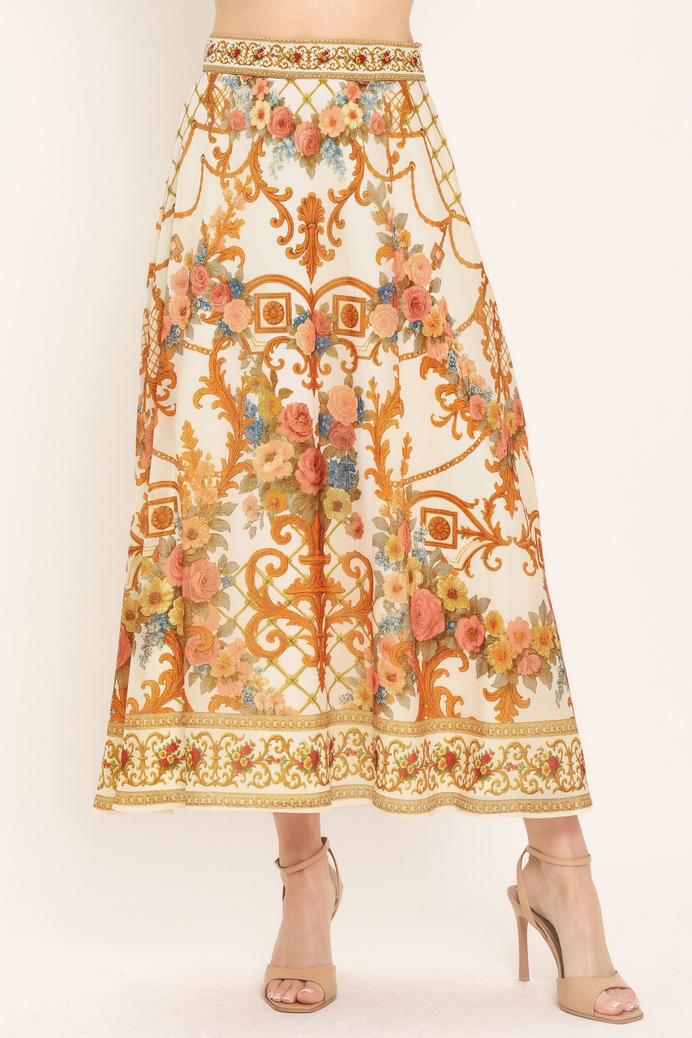 Woman wearing midi skirt with floral and geometric baroque pattern | Flying Tomato