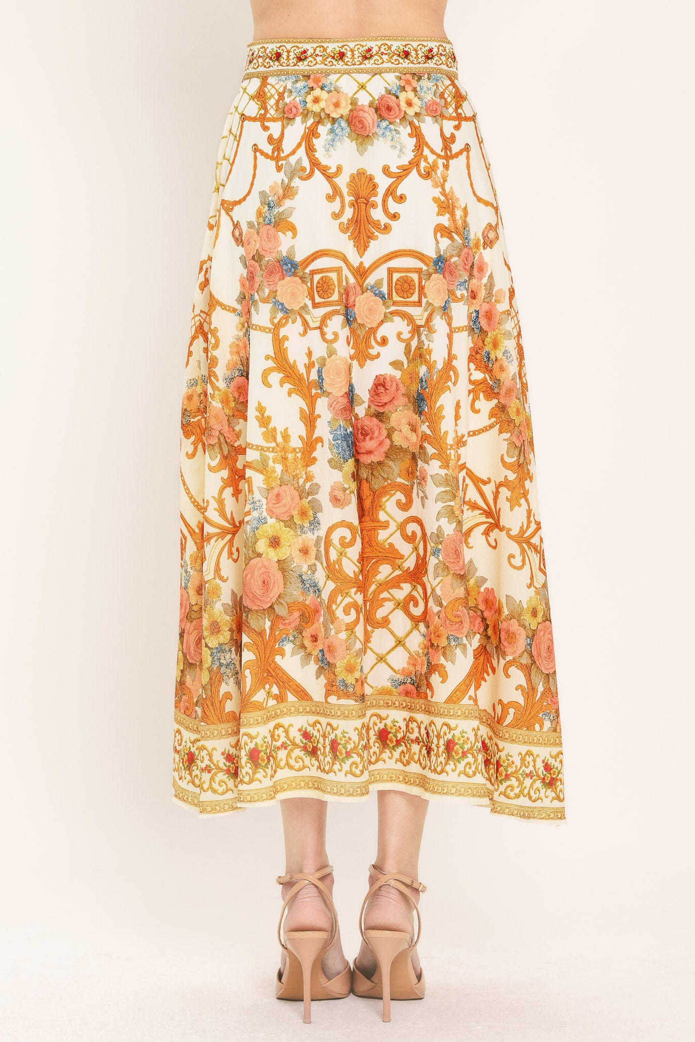 Woman wearing midi skirt with floral and geometric baroque pattern | Flying Tomato