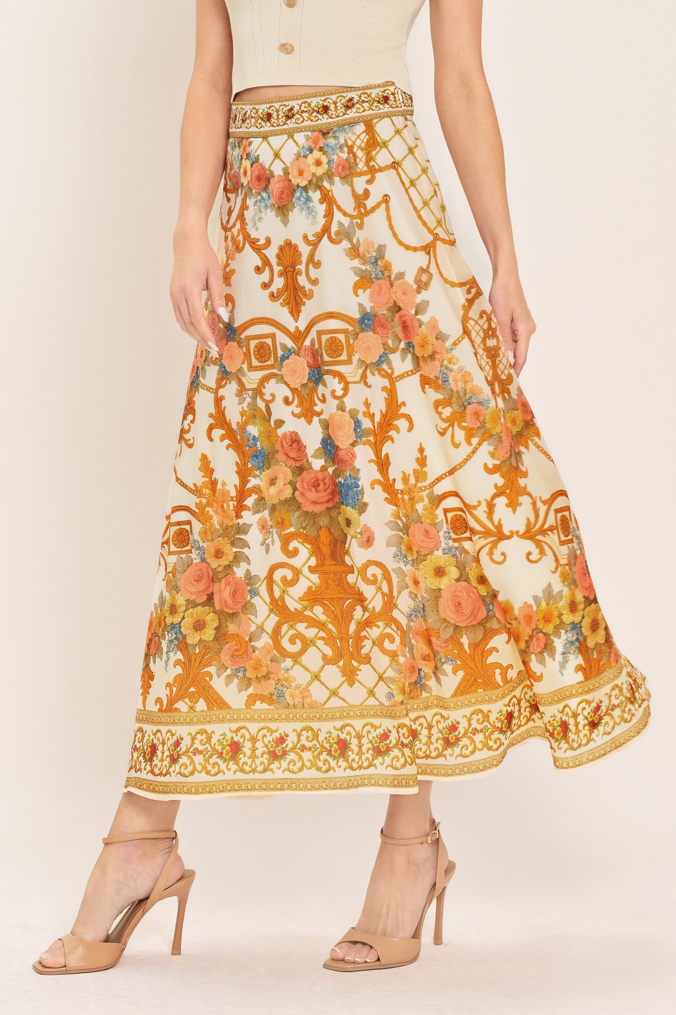 Woman wearing midi skirt with floral and geometric baroque pattern | Flying Tomato