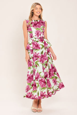 A high-waisted, A-line midi skirt with a vibrant pink and green floral print on a white background | Flying Tomato